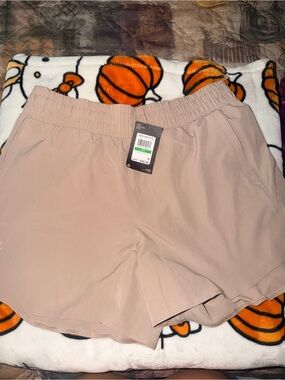 Under Armour Women's Athletic Shorts in Light Taupe